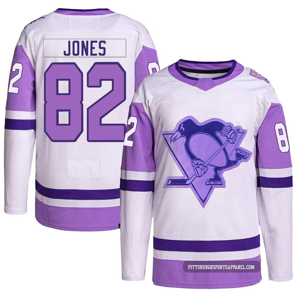 Youth Caleb Jones ＃82 Authentic White/Purple Pittsburgh Penguins Hockey Fights Cancer Primegreen Jersey